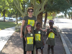 OFA mom, Cami, along with her adorable children: Grace, Joeseph, and Solange.  They, along with more than 20 of their friends and family created Team Jamaa Letu at the Phoenix, Arizona Run for Congo Women 